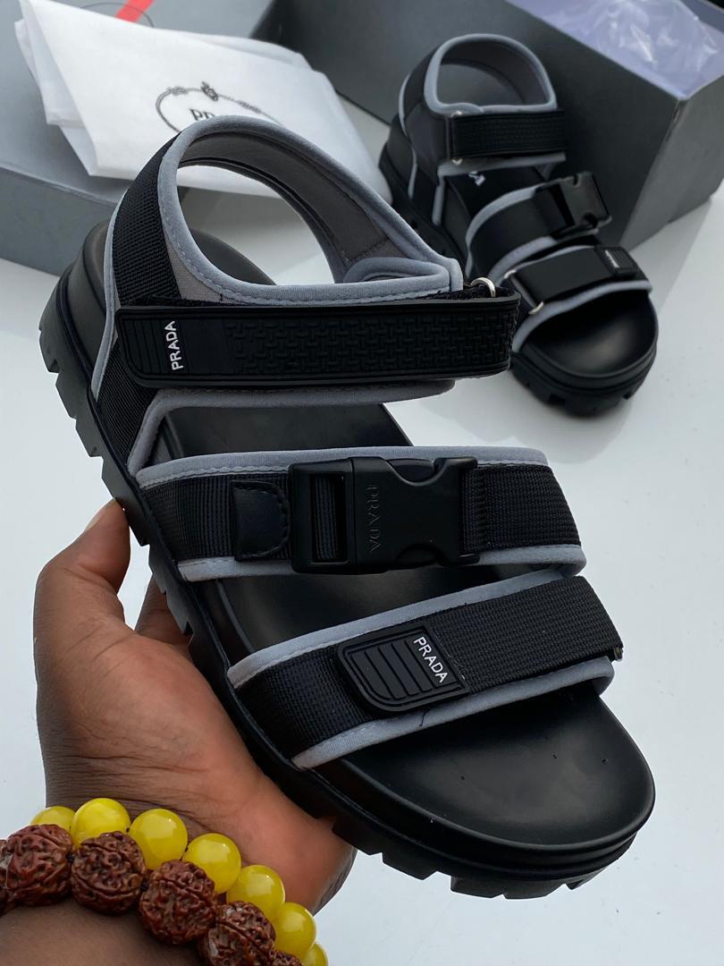 a4a28b1e-2f14-4ff2-b795-1268f6a906a4 Prada Strapped Nylon Sandals | Arvoluxury - Image 1
