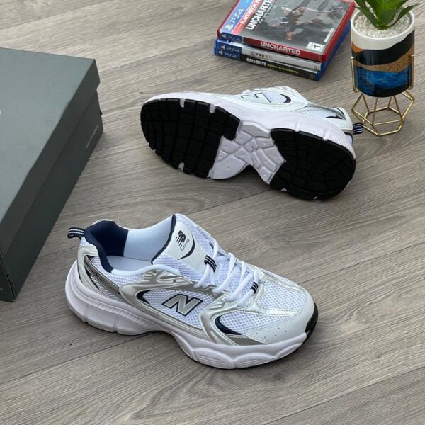 New Balance 530 Sneakers in White and Silver | Available at Arvoluxury