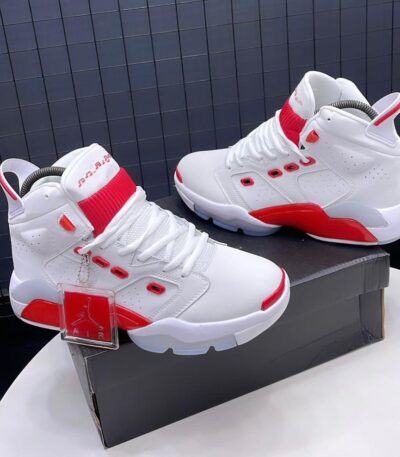A pair of white and red Air Jordan high-top sneakers on display, perfect for sneaker enthusiasts in Nigeria.