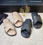 High-quality image of luxurious double strap slide sandals in beige and black, showcasing comfort and style.