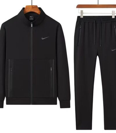 A stylish grey tracksuit comprising a zip-up jacket and matching joggers, perfect for making a statement.